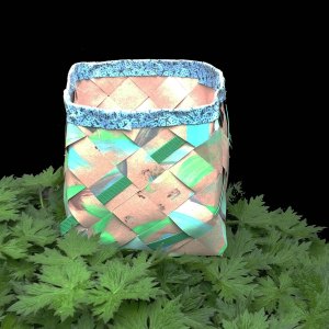 tub with corners woven from strips of paper